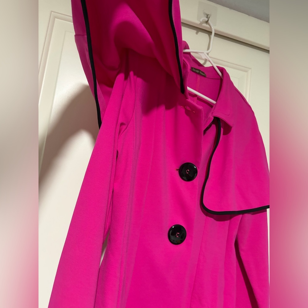 Design Today’s Vibrant Pink Cape Coat with Black Trim - Picture 5 of 7